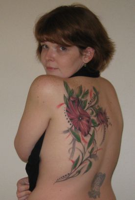 Girl's Back Flower Tattoo